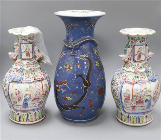 A 19th century Chinese blue ground dragon vase and a pair of famille rose vases tallest 36cm
